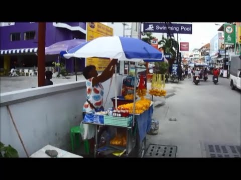 SOI BUAKHAO PATTAYA THAILAND AND THE PEOPLE WHO LIVE THERE. STREET VENDORS SELLING THEIR WARES.